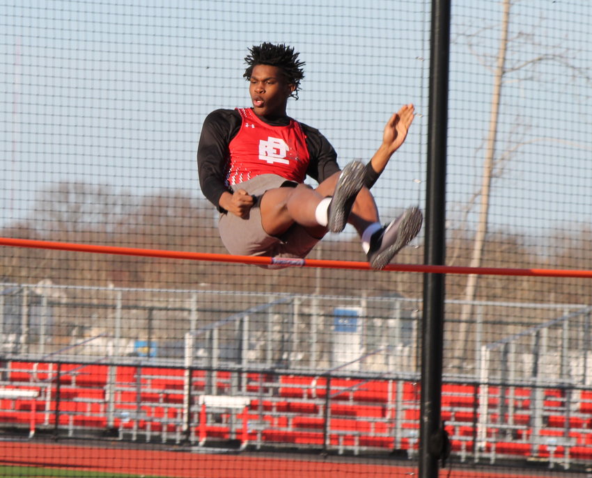 East Providence High School's Kenaz Ochogwu clears six feet in the boys' high jump en route to winning the event during the first-ever outdoor track and field meet held inside the new Townie Stadium on campus Monday afternoon, April 3.