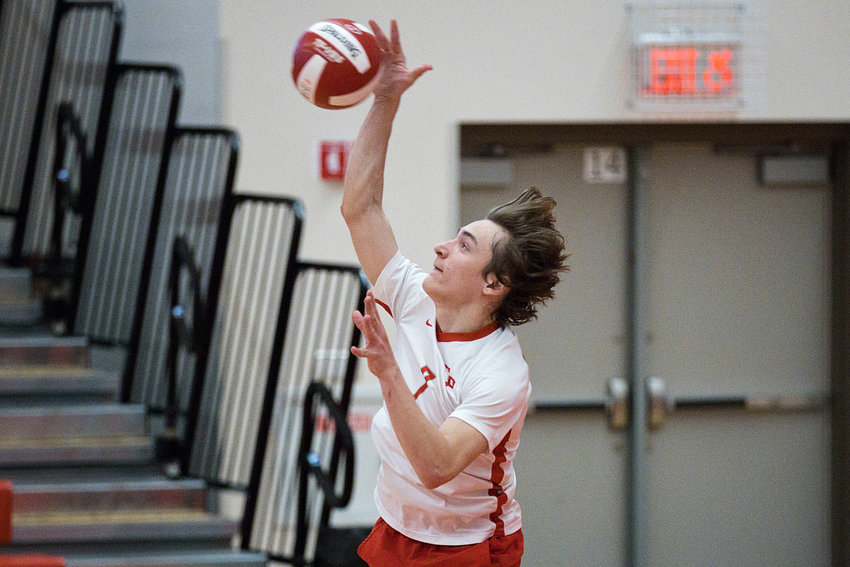 East Providence High School's DJ Lepine fires a serve for the Townies against Mount St. Charles during a non-league boys' volleyball outing two weeks ago. Lepine, a junior setter and opposite side hitter, is the lone returning starter for EPHS this spring.