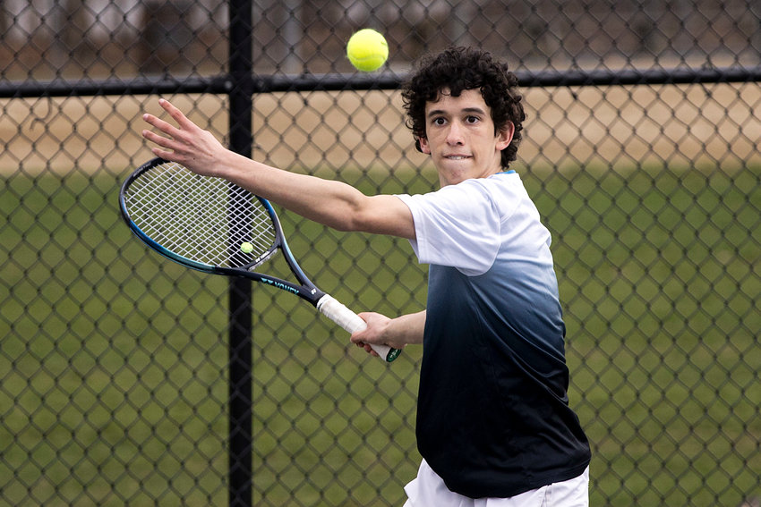 Barrington's number one singles player, Luke Sapolsky sends the ball back to his opponent during a recent match.