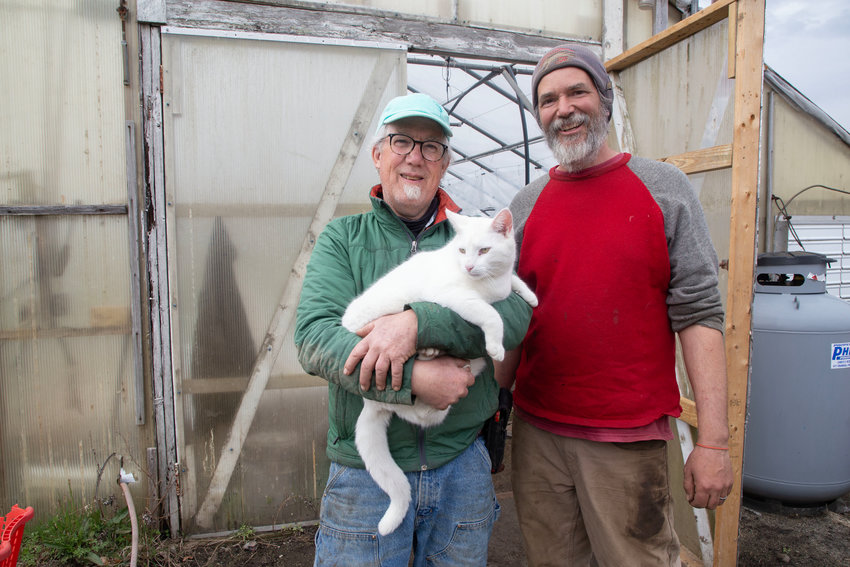 Farmers Skip Paul (left) and Ben Wolbach hope to ease local pressures on farming here by housing seasonal workers on-site.