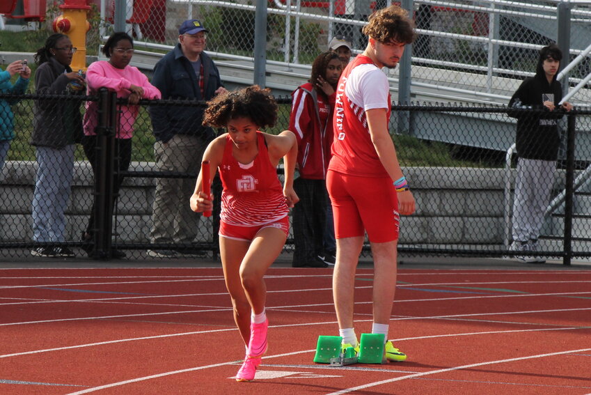 East Providence High School's Giselle Raphael breaks from the starting blocks in the girls' 4x100 meter relay during the Eastern Division outdoor track and field meet hosted by the Townies on Monday, April 24.
