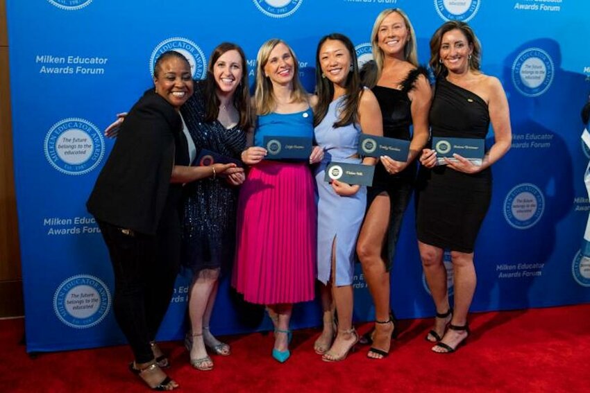 Emily Rendine (second from right), received her 2022 Milken Educator Award along with fellow honorees (from left to right) Dr. Natasha Cooke-Nieves of New York, Maine's Sarah Collins (ME '22), Leigh Beson of Massachusetts, Elaine Hill of Connecticut and New Jersey's Shaina Brenner during a recent gala held in California.