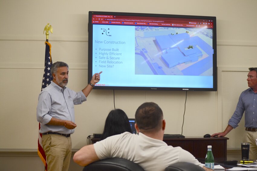 Robert Santos, Senior Associate for architectural firm Perkins Eastman, shows an example of what a hypothetical new high school design could look like to the Bristol Warren School Committee during a meeting on Monday night.