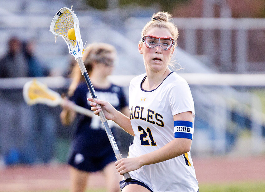Barrington's Violet Gagliano, shown during the Eagles' game against South Kingstown, had five goals, three assists and nine draw controls in the win over Portsmouth.