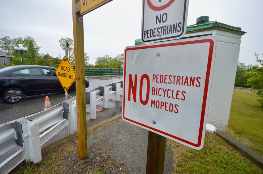 This new sign that recently cropped up on the Portsmouth side of the Mt. Hope Bridge (an identical sign is posted on the Bristol side) makes it clear that bikes are not welcome, which came as a surprise to local bike advocates. The R.I. Bridge and Turnpike Authority, however, says bicycles have never been permitted despite earlier signs and bike maps to the contrary.