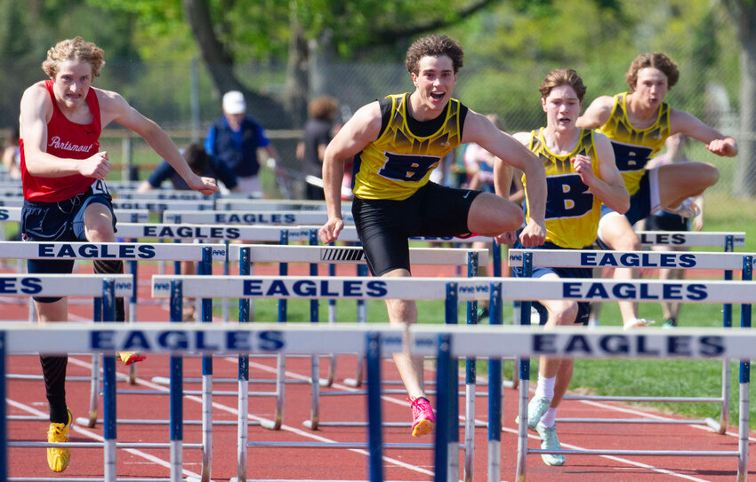 Ethan Knight (middle), shown competing in the Eastern Division Track Championship, won the 110-meter hurdles in the Class B Championship.