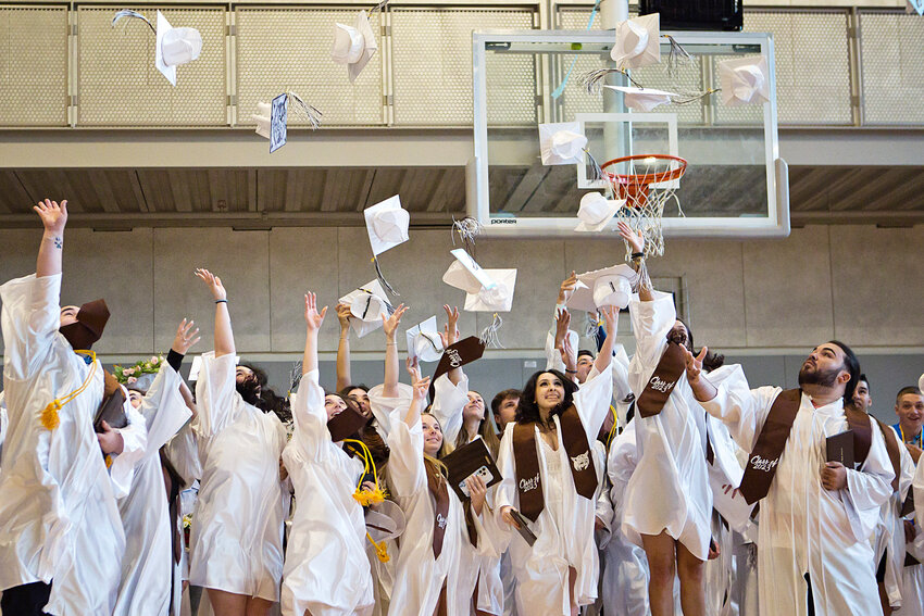 Members of Westport's Class of 2023 toss their caps after their graduation ceremony Saturday.&nbsp;