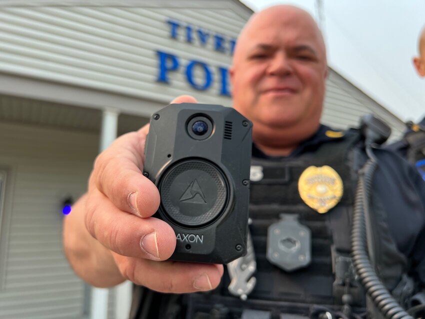 Lt. Daniel Raymond shows one of the Tiverton Police Department's new body cams.