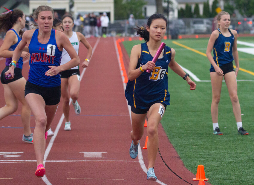 Barrington's Indie Lamb, shown competing at a meet last year, partnered with Evelyn Lefort, Gracie Gaines and Ginevra Girardello win the 4x800-meter relay at the recent Class B Injury Fund Relay.