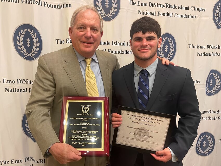 Sandy Gorham (left) and Noah Kranowitz receive awards at the recent Emo DiNitto/RI Chapter of the National Football Foundation and College Hall of Fame awards banquet.