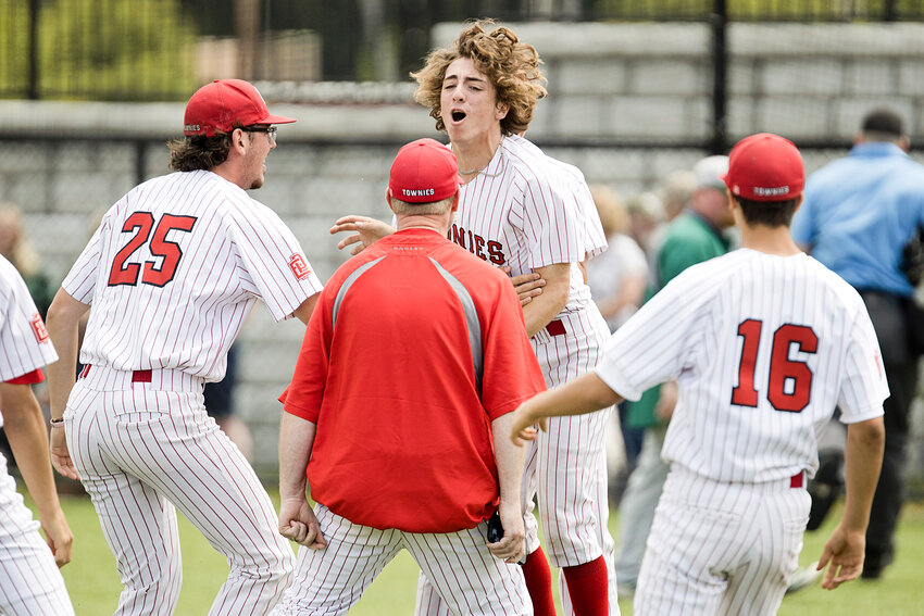 Winning pitcher Tim Robitaille and his EPHS mates celebrate their victory over Chariho, June 10, which sent the Townies into the 2023 Division II baseball championship series.