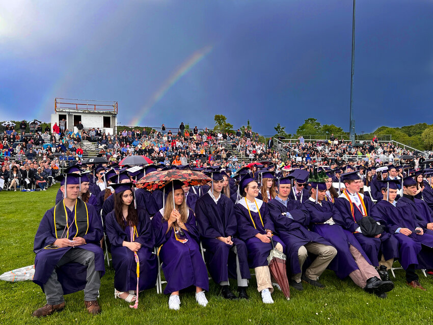 A faint rainbow appeared after reprieve from steady rainfall during Mt. Hope's commencement at the high school on Friday evening.