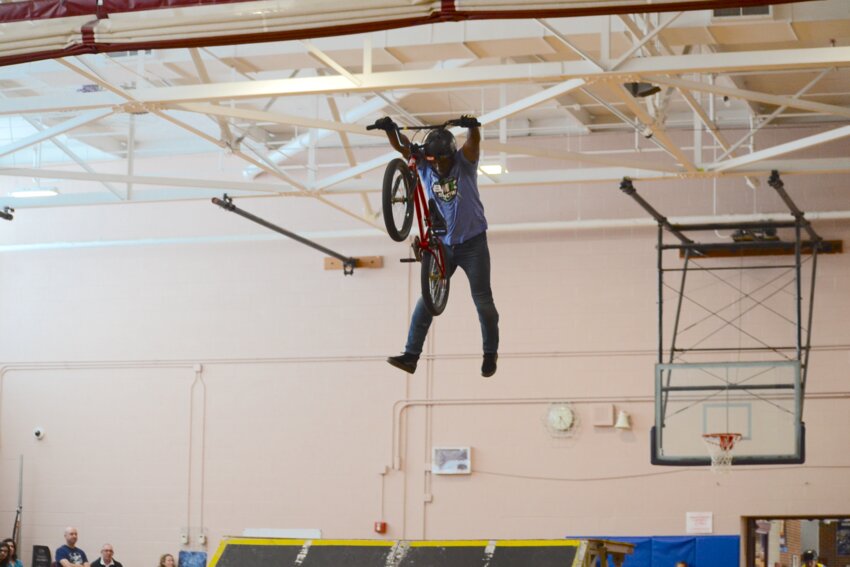 Andre Tostell of BMX Experience performs a &ldquo;Superman&rdquo; during the event, which strives to capture adolescents&rsquo; attention through high-flying extreme sports to deliver messages of positivity.