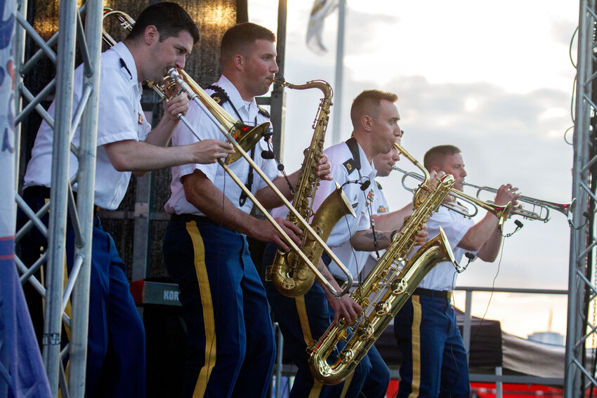 The Coyote Brass of the 88th Army Band jams on the Bristol Fourth of July Concert stage during the opening concert at Independence Park on Tuesday night.