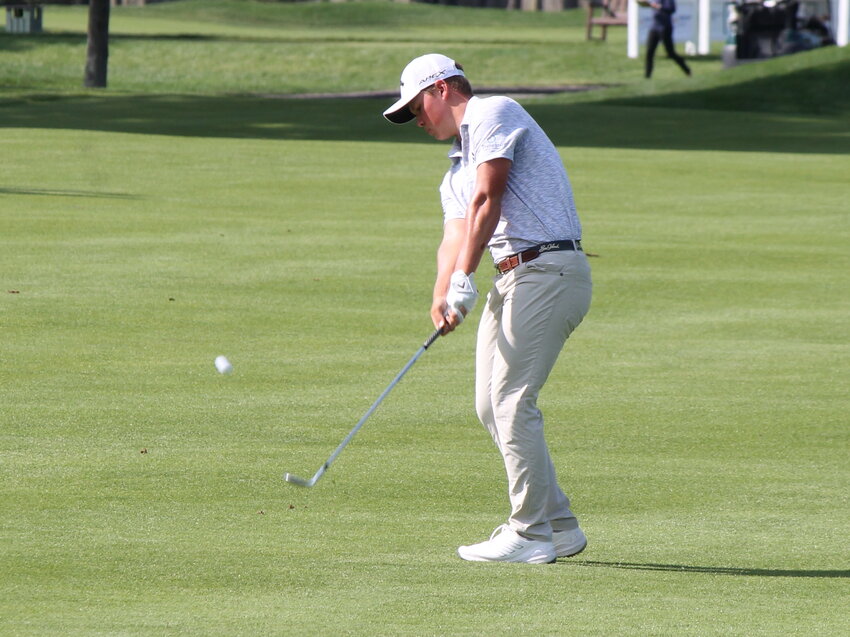 Caleb Surratt, the standout freshman from the University of Tennessee, wedges up to the 18th green at Wannamoisett Country Club after a lengthy tee shot to close out his first round of the 2023 Northeast Amateur Invitational Wednesday, June 21.