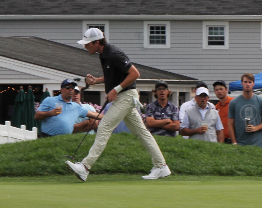 Nicholas Dunlap pumps his fist in elation after he made a 20-foot birdie putt on the 72nd hole to win the 2023 Northeast Amateur Invitational Saturday, June 24, at Wannamoisett Country Club.