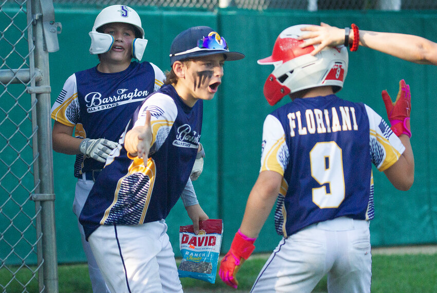 Barrington 12U All Stars Luke Fluet (center) and Luchi Floriani (right) celebrate during a recent win. Barrington will play at Portsmouth on Wednesday, July 12.