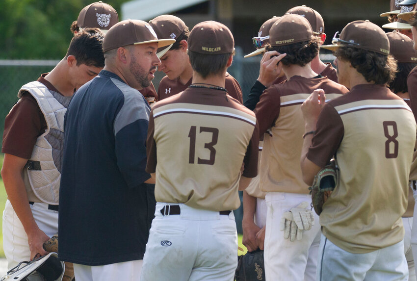 Athletic director and baseball coach Jason Pacheco talks to the team this Spring.