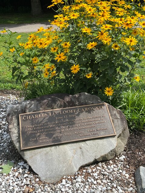 The plaque recognizing the &quot;Carousel Five&quot; on the grounds of the Looff Carousel at Crescent Park.
