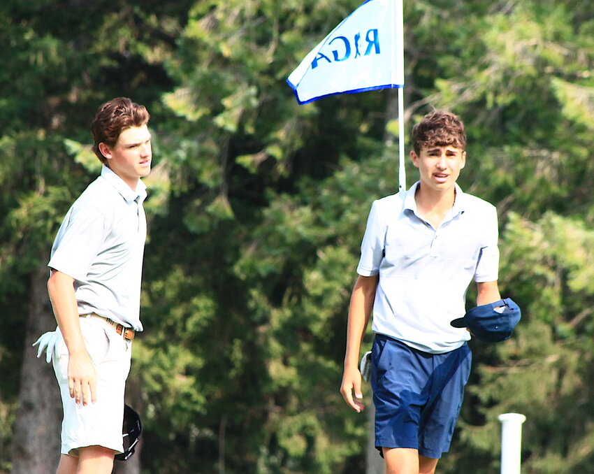AJ Colonna (right) walks off the 16th green at Ledgemont CC Thursday, July 27, after beating Barrington High teammate Adam Gorman (left) for the RIGA Junior Amateur First Division title.