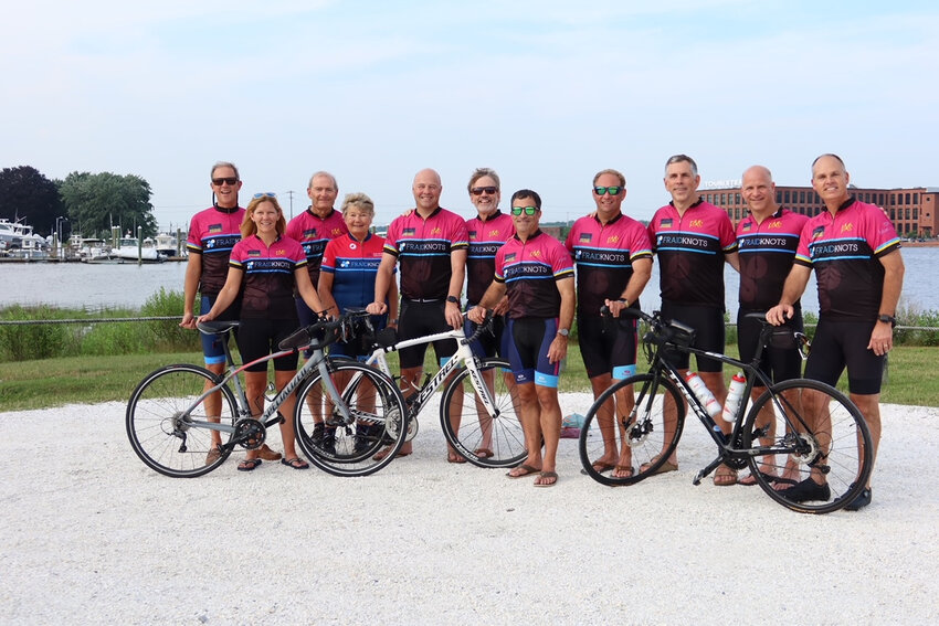 Members of Team Fraid Knots pose for a photo. The group has raised more than $1 million while participating in the Pan Mass Challenge over the last 15 years.