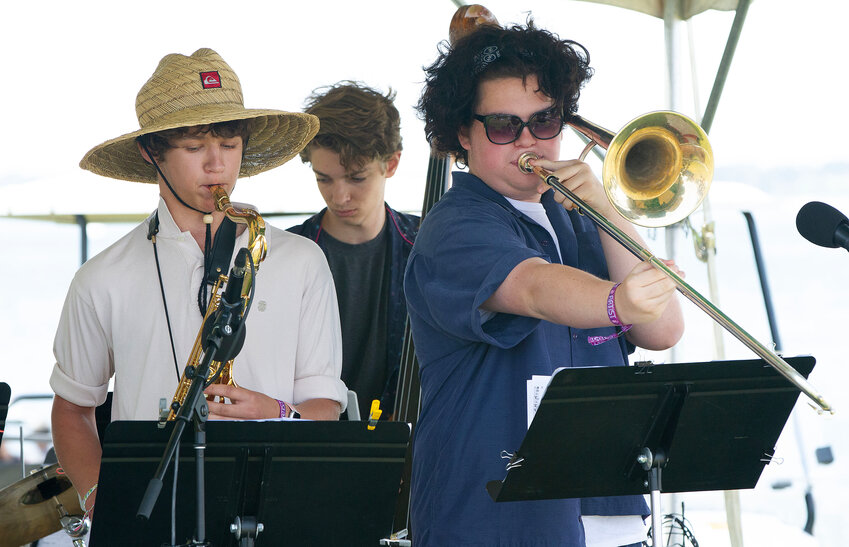 Barrington High School&rsquo;s Moses Densley, Jason Buka and Miles Burke (from left to right) perform at the Newport Jazz Festival on Friday, Aug. 4.