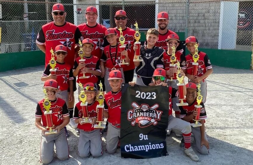Members of the -9-U All Stars, champions of the Rochester tournament, pose with their loot. From left to right, bottom to top are Shea MacGillivary, Dax Michaud, Chace Silva, Gavin Grimm, Liam Destremps, Landon Ottilige, Brandon Flores, Calvin Medeiros, Jacoby Teixeira, Liam Moore and Weston&nbsp;Methia. Coaches left to right include Jason&nbsp;Methia, Kerry Grimm, Dan Medeiros and Manager Mike Silva.