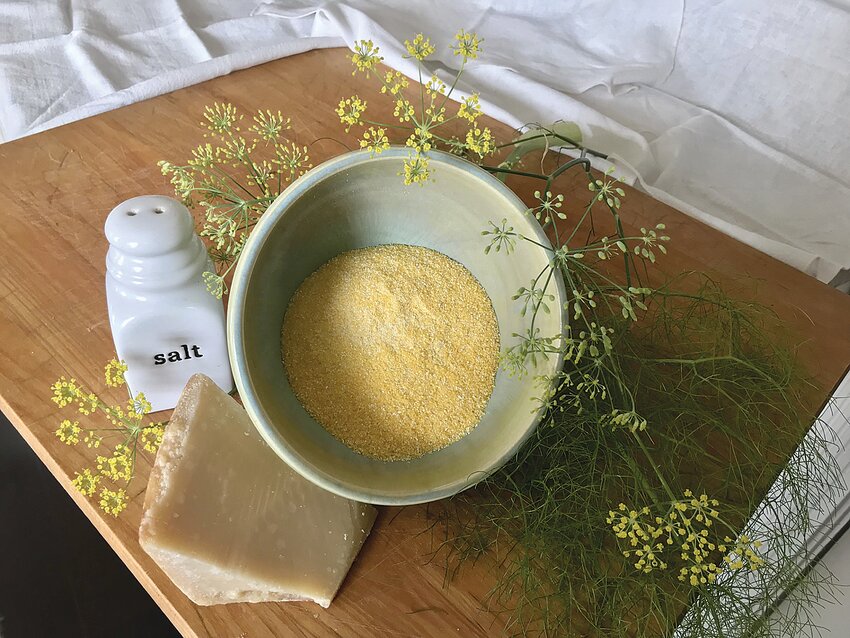 The author mixes polenta with fresh sprigs of fennel, grated cheese and salt &mdash; much as her grandmother did.
