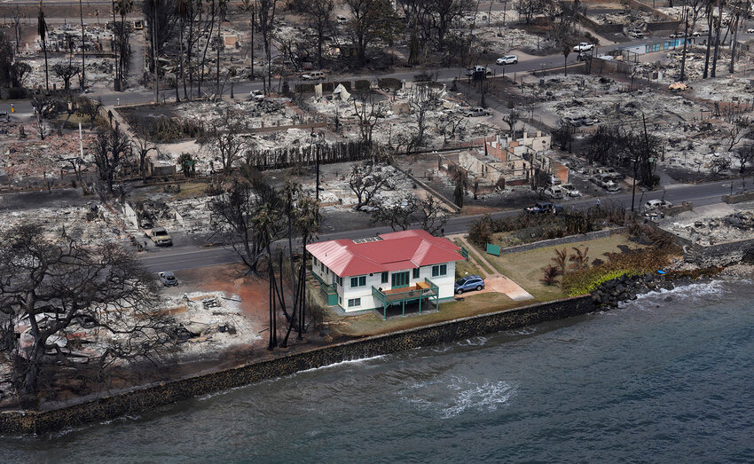 A building appears untouched by the wildfire which destroyed the historic town of Lahania Thursday, Aug. 10, 2023, on Maui. (Kevin Fujii/Civil Beat/2023).
