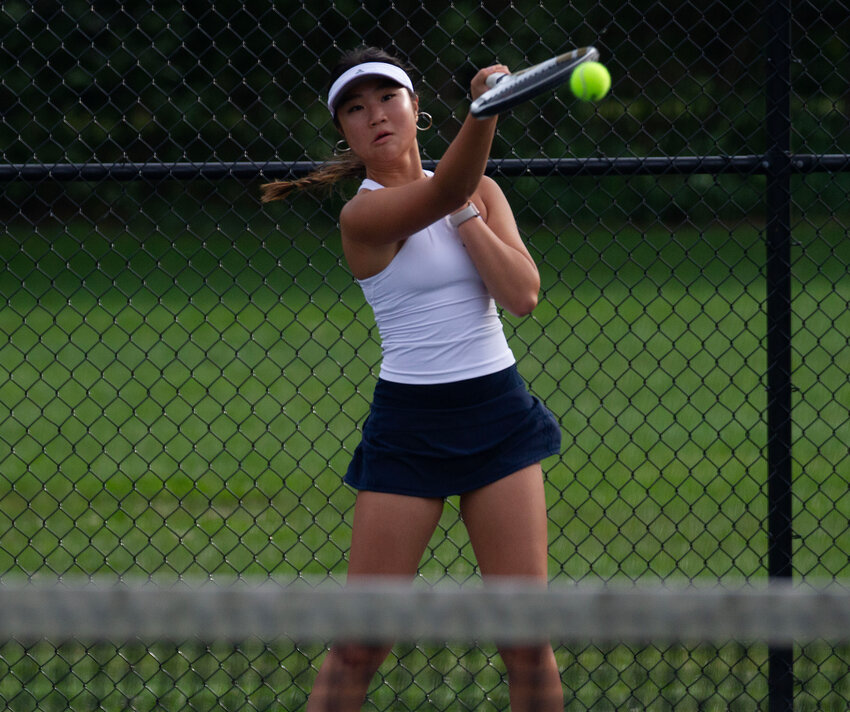 Barrington High School&rsquo;s number four singles player Charlotte Byon returns a shot during the Eagles&rsquo; match against North Kingstown last week.