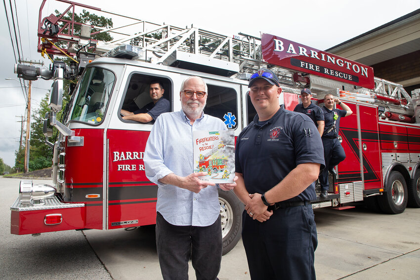 Author and illustrator R.W. Alley stands with Barrington Firefighters Milos Mirkovic, Nick Tessitore, Joseph Leighton and Bill Kneebone (from left to right). The fire department helped Alley with some expert advice for the book.