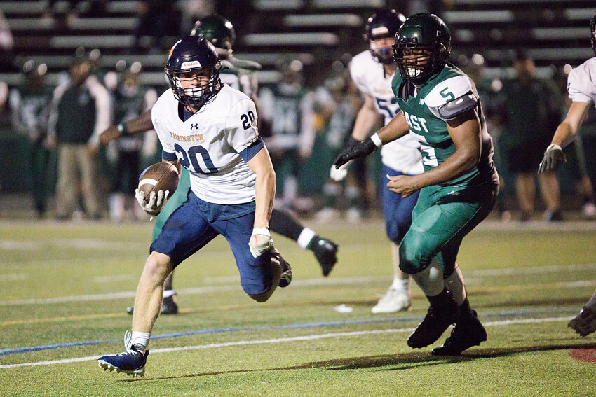 AJ DiOrio races around the Cranston East defense to score in the first half of Friday's game.