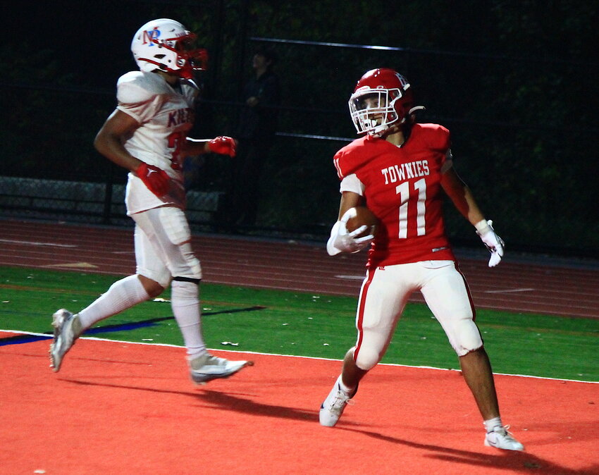 Lucas Santa Cruz scores one of East Providence High School's touchdowns in the Townies' 24-19 loss to visiting Mt. Pleasant Thursday night, Oct. 5.