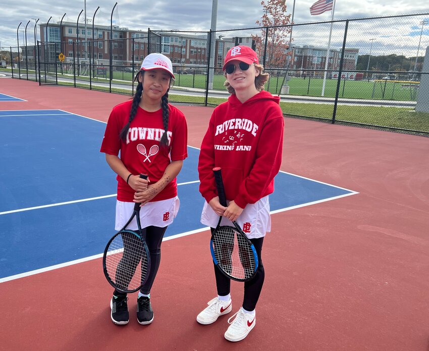 The EPHS top pair of Madison Luu (left) and Isabella Hurley won the Division III doubles tournament title with a straight sets win over West Warwick Sunday, Oct. 22, in city at the Townie Tennis Center.