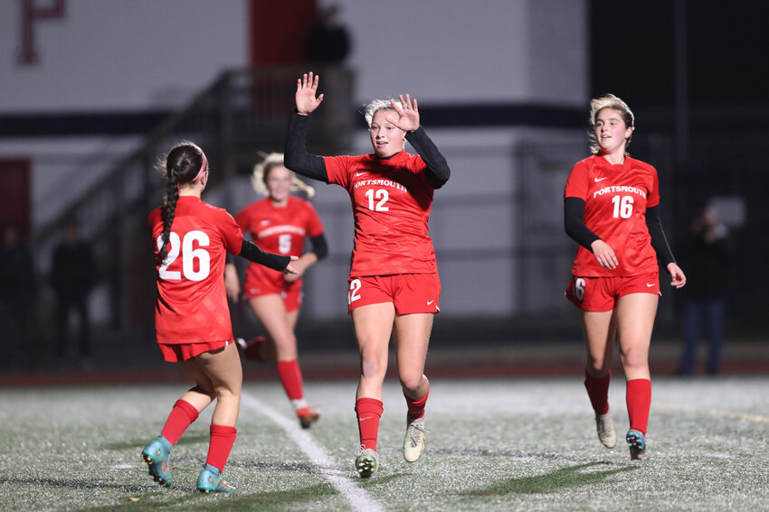 Portsmouth High&rsquo;s Abigail Costa, Mollyana McGuire, and Evelyn Shuster (from left) celebrate a goal against North Smithfield during the Patriots&rsquo; 4-0 quarterfinal win last Friday. Lila Kirwin is in the background.