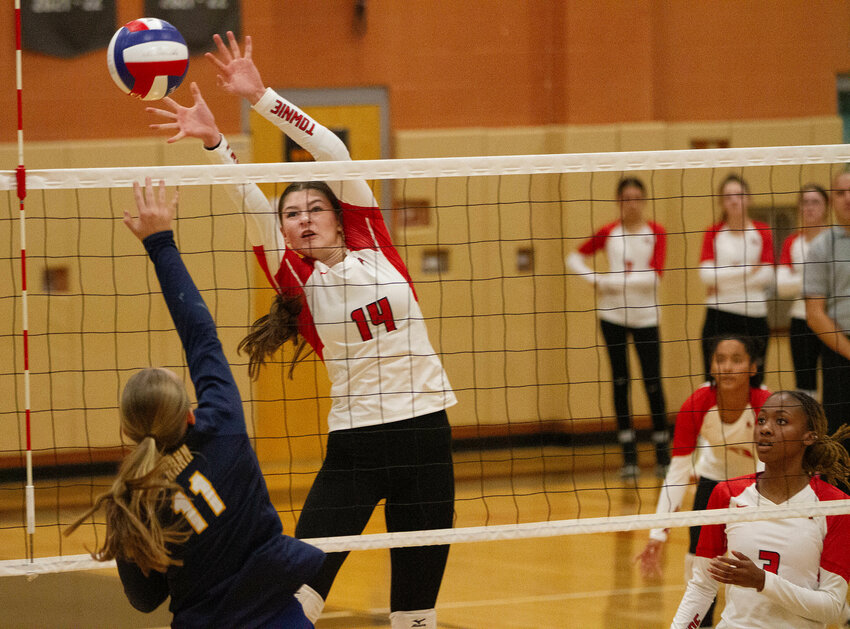 East Providence's Keira Mullen attempts to block a shot by a Barrington opponent in the teams' Division II girls' volleyball semifinal match Tuesday, Nov. 7, in North Kingstown.