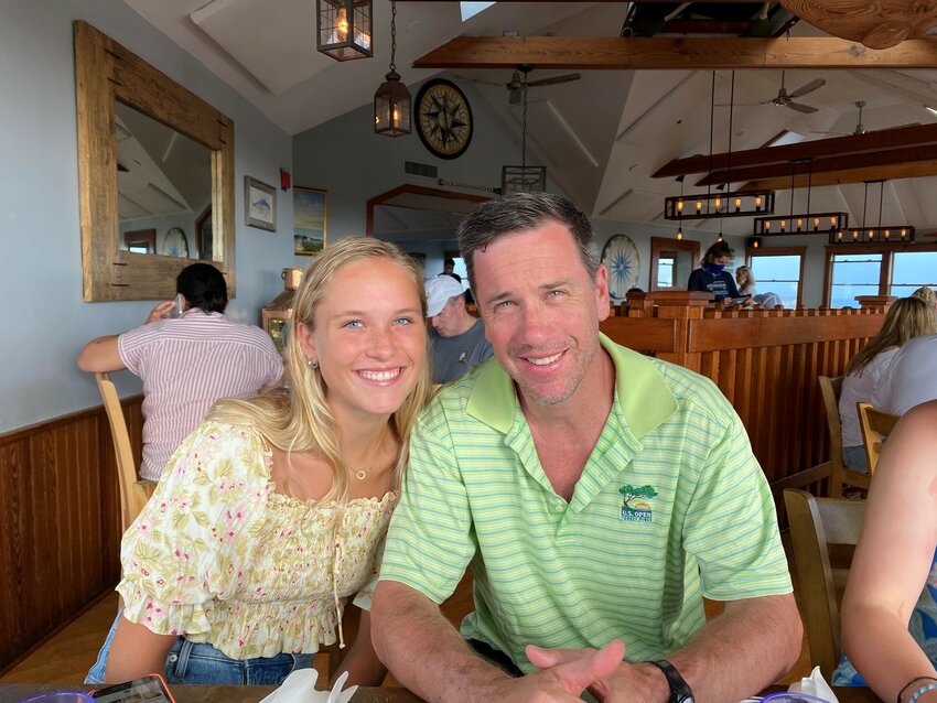 Hope Robertson is pictured with her father, Dr. Alex Robertson. Hope is running in the B.A.A. Half Marathon on Sunday in memory of her father who lost his battle with cancer in March.
