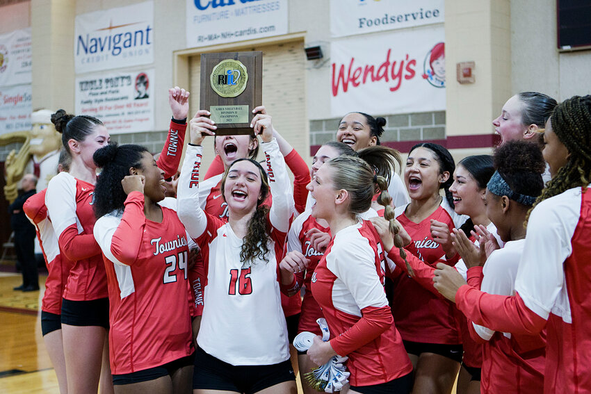 The EPHS girls' volleyball team celebrates winning the 2023 Division II championship after the Townies defeated Cumberland 3-0 in the final Saturday, Nov. 11, at Rhode Island College.