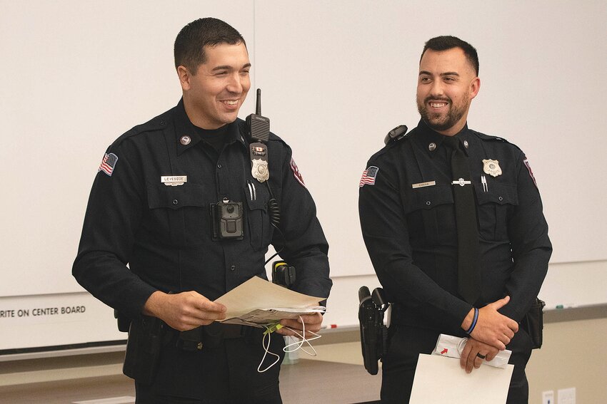 Westport patrolmen Jarrod Levesque (left) and Michael Chicca received the lifesaving award at the station on Thursday.&nbsp;