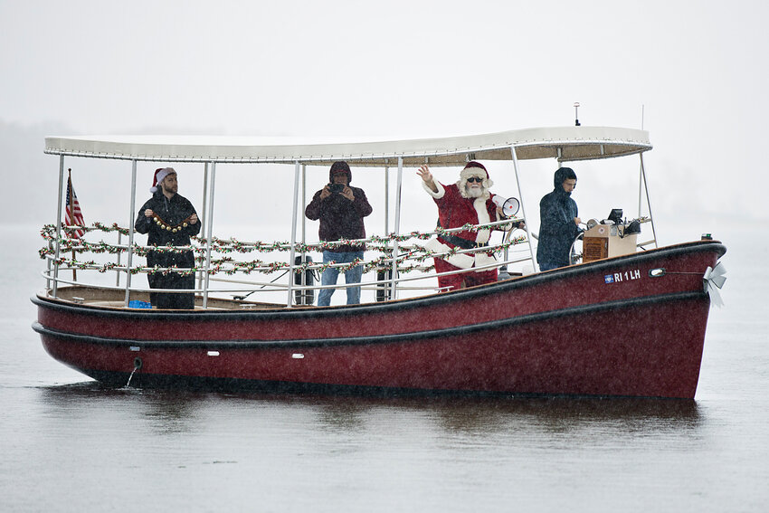 Santa Claus reached the shores at Sabin Point Park on a rainy Saturday morning, Nov. 18, aboard the &quot;Lady Pomham II,&quot; the Friends of Pomham Rocks launch.