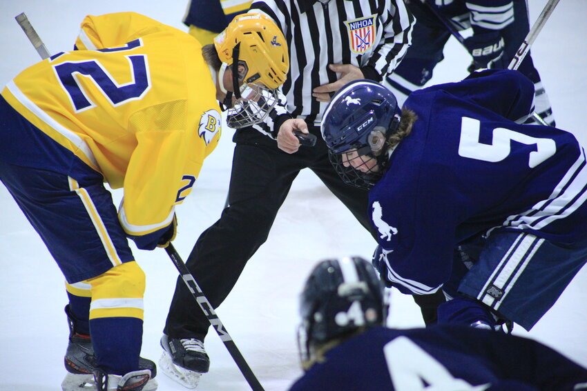 Barrington&rsquo;s Trevor Snow (left) gets ready to battle for the puck during a face-off on Wednesday night, Dec. 13.