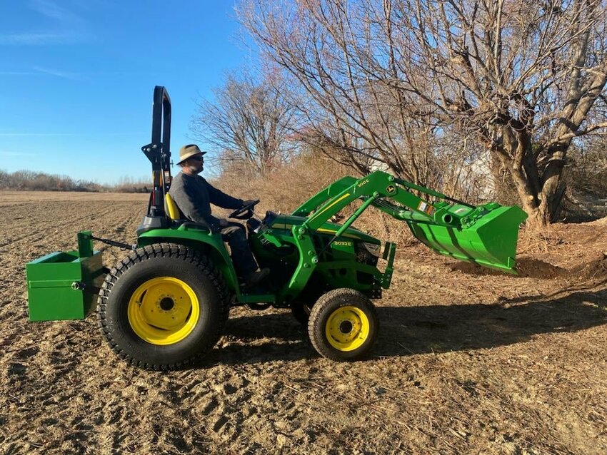The farm tractor at the Portsmouth AgInnovation Farm will soon get a shed, thanks for recent grants from The Champlin Foundation and BankNewport.