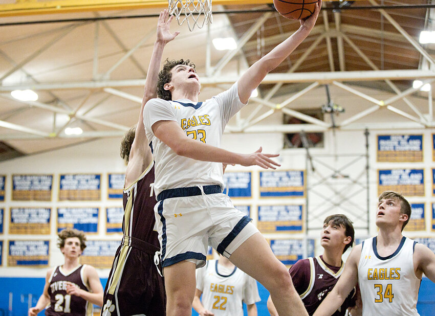 Ryan Rigamonti goes in for a lay-up during the second half of Wednesday's game, against Tiverton.
