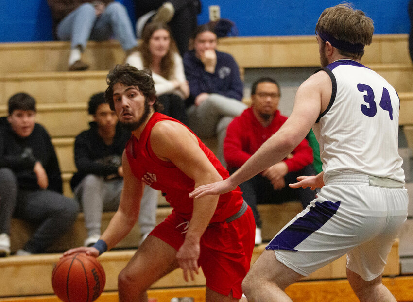 Will Alves looks to drive to the basket during Portsmouth's win over Mt. Hope during a holiday tournament in Barrington.
