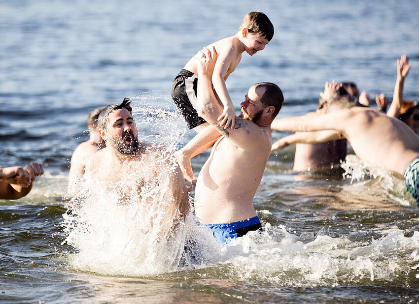 More than 100 people participated in the BBCA's New Year's Day Dip in the Bay.