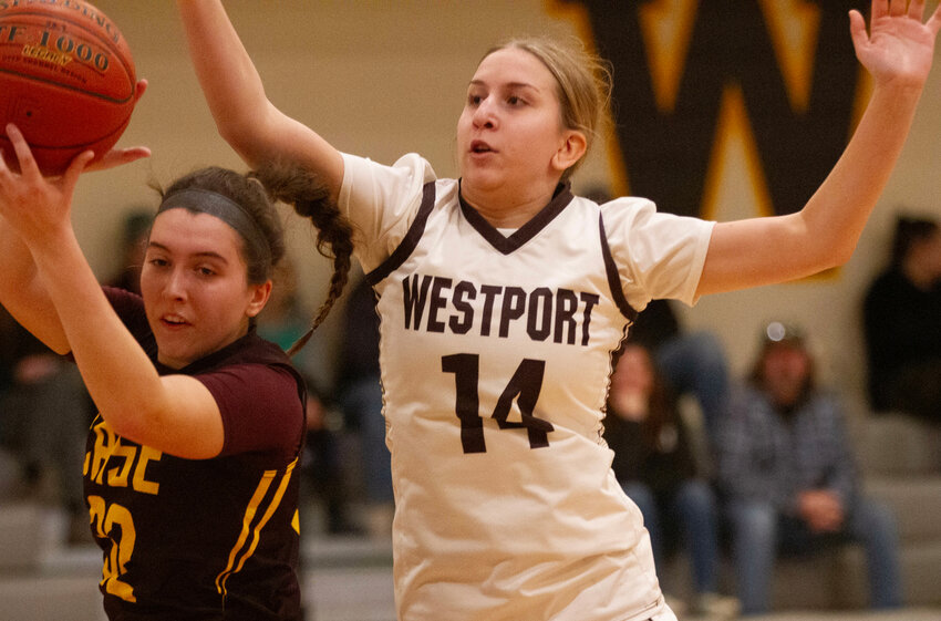 Freshman forward Skylar Rezendes defends the Westport basket in the first half of their home loss to Case on Wednesday.
