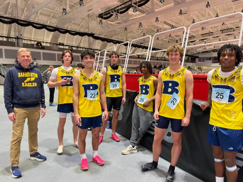 Members of the Barrington High School boys track team competed in the Marathon Sports Winter Classic in Boston on Sunday. Pictured are (from left to right) Coach Bill Barrass, Bobby Wind, Jared Lesk, Ethan Knight, Chucky Potter, Ryan Martin, and Charly Potter.