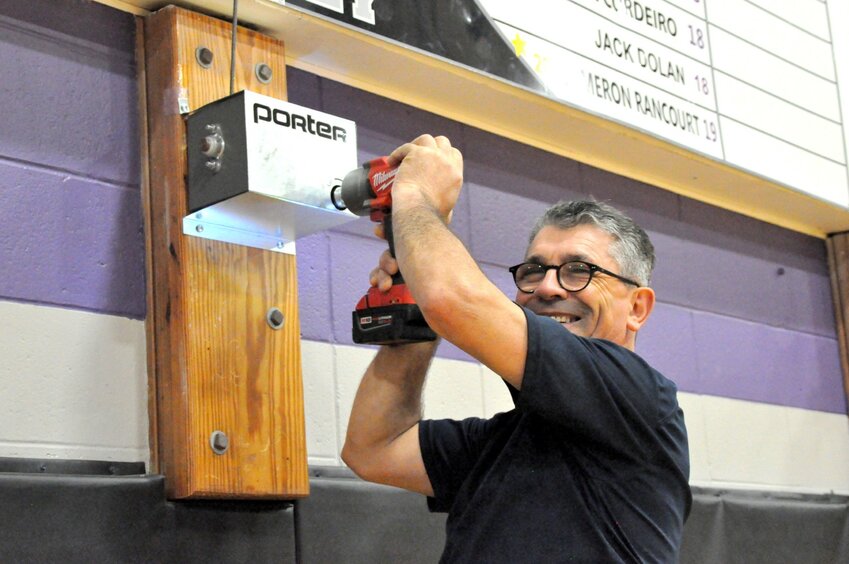 A little hard work inside the Mt. Hope High School gymnasium never hurt likeable custodian Vinnie Miranda.