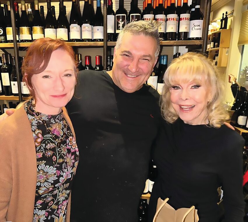 Mary Beth Ryder, Michael St. Angelo and screen legend Barbara Eden, now 92 years old, pose inside Spaghetti Lane after the actress visited for dinner.