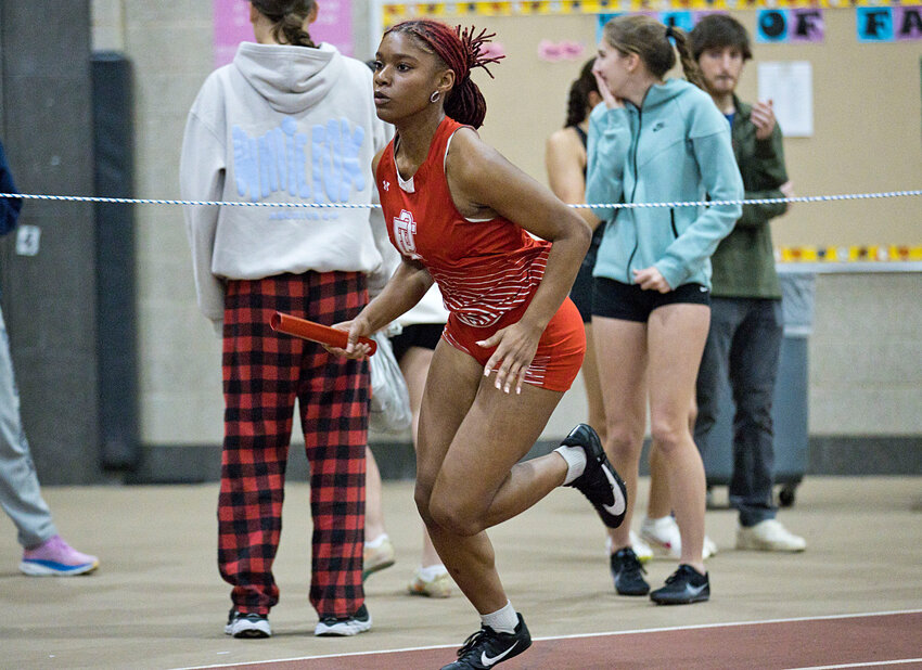 East Providence High School's Kandace Daniel runs a leg of the 4x200 meter relay for the Townies in their girls' indoor track and field Suillivan Division dual meet held last Thursday night, Jan. 11, at Providence Career and Tech Academy Fieldhouse.